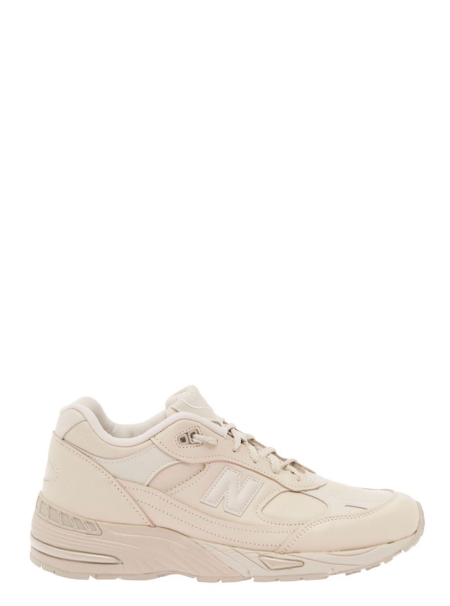 '991' beige panelled sneakers with logo patch in leather and fabric man