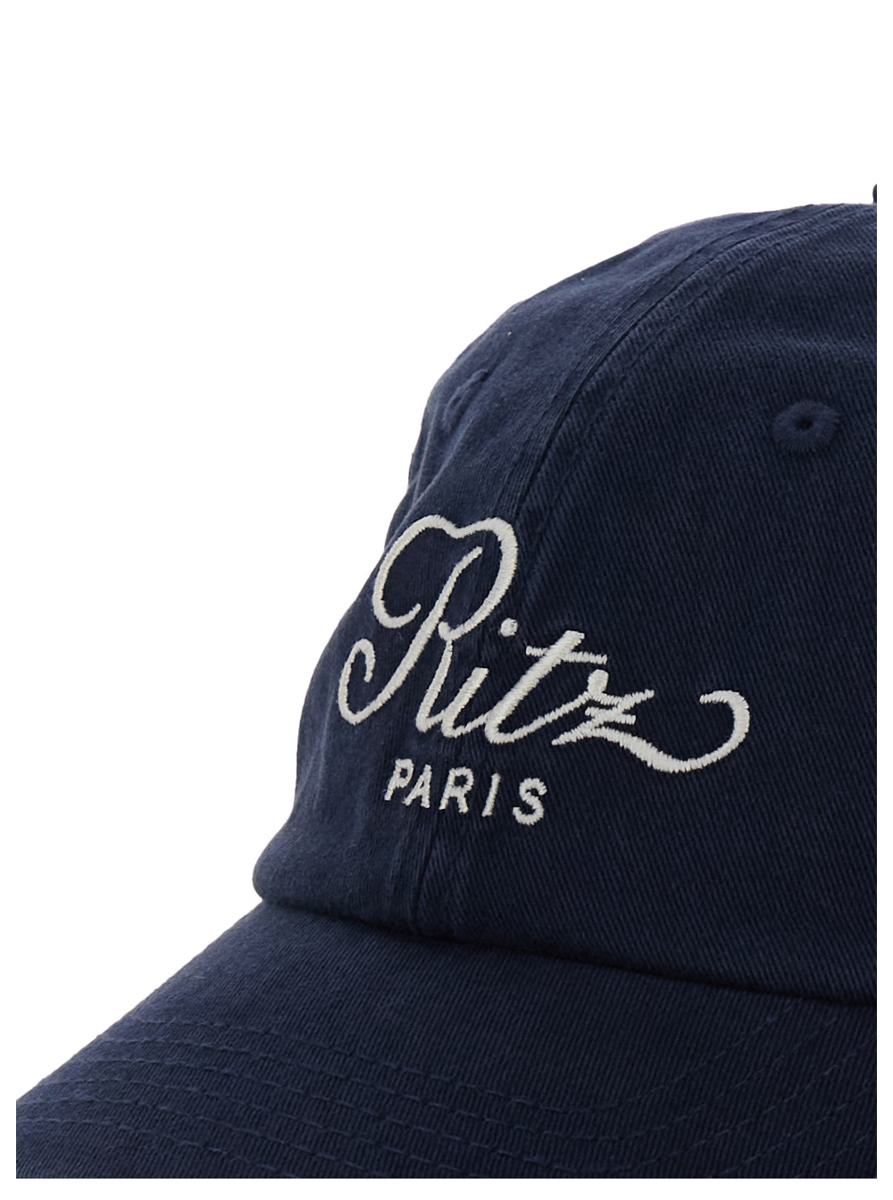 blue baseball cap with print on the front and logo lettering on the rear in cotton woman