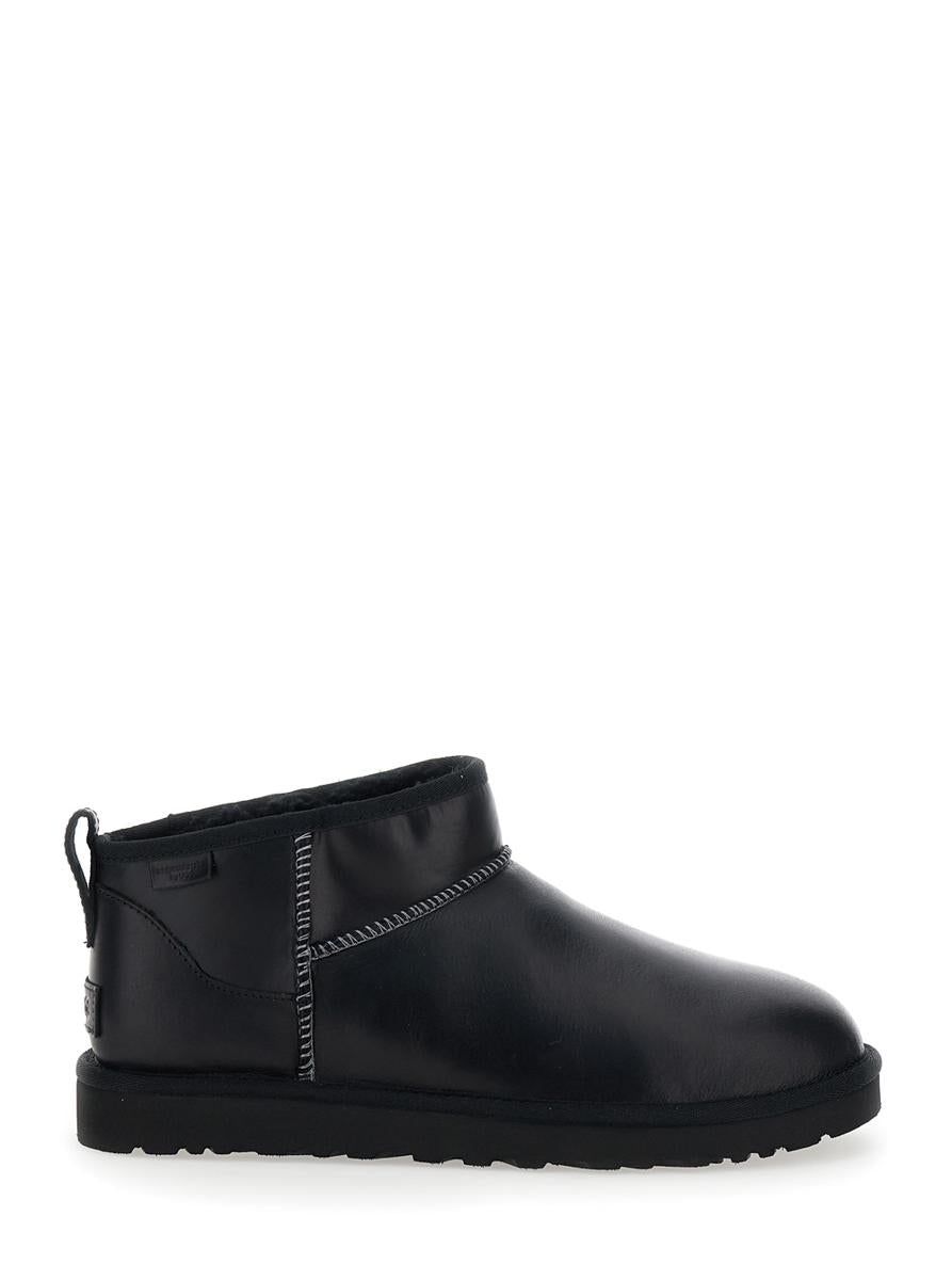 ''classic ultra mini' black boots in leather woman