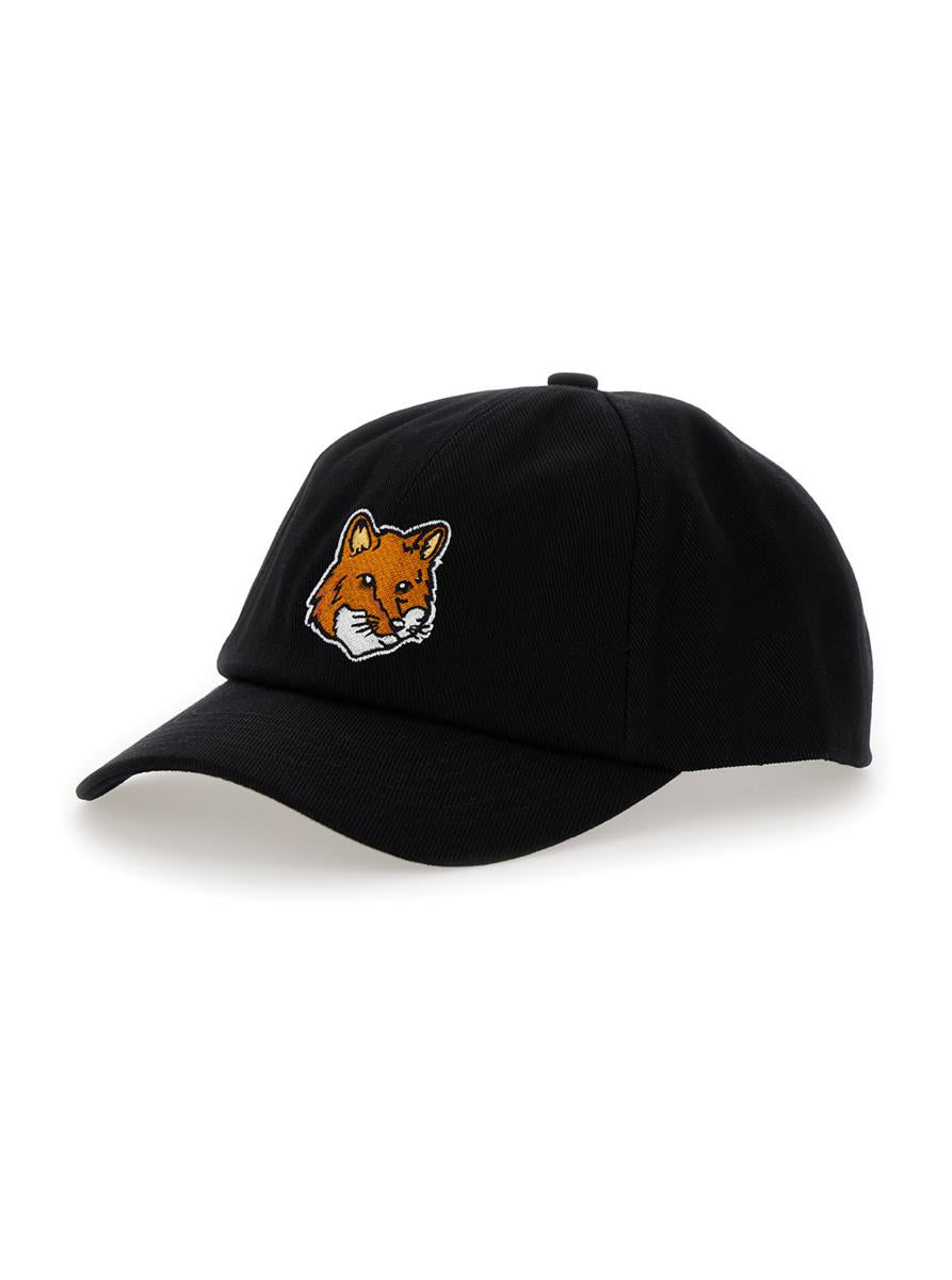 black baseball cap with fox head patch in cotton man