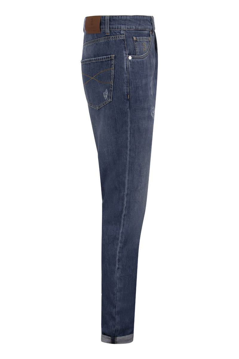 brunello cucinelli five-pocket leisure fit trousers in old denim with rips