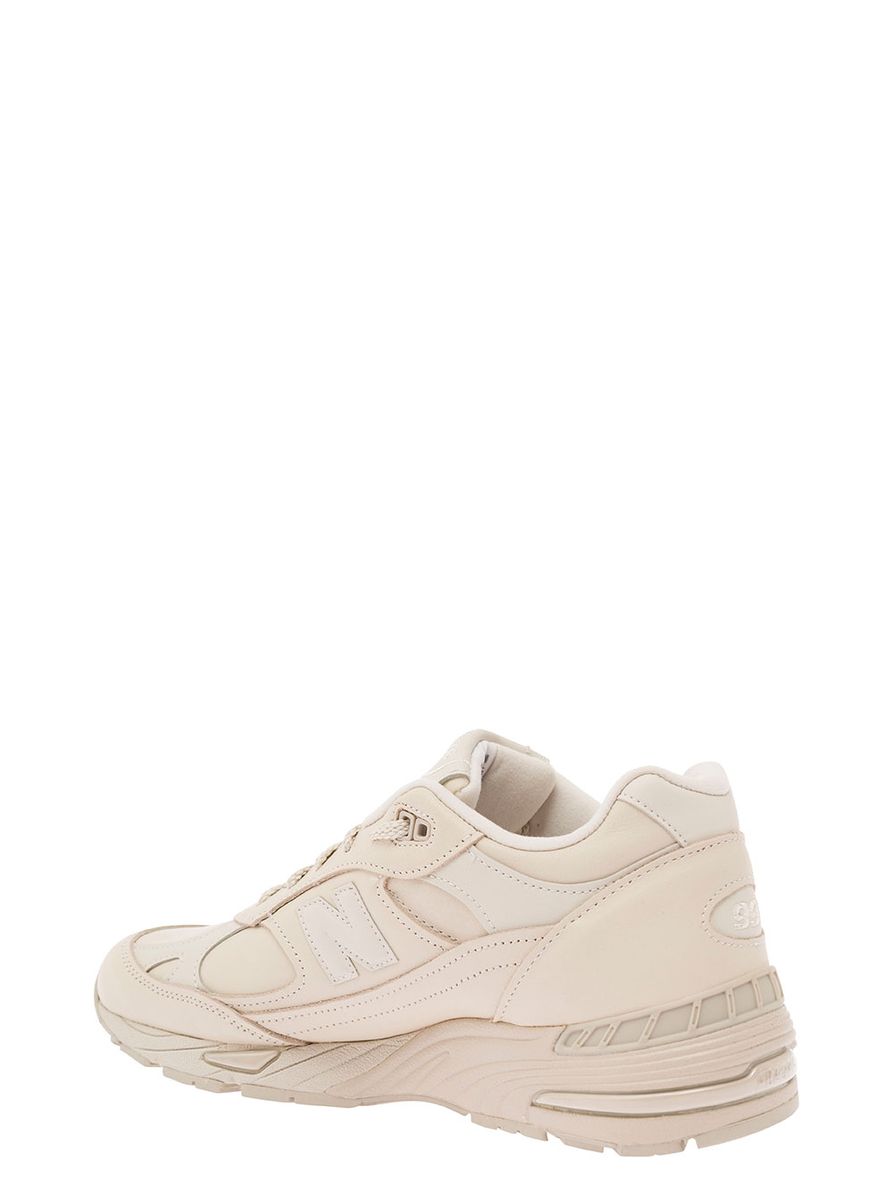 '991' beige panelled sneakers with logo patch in leather and fabric man